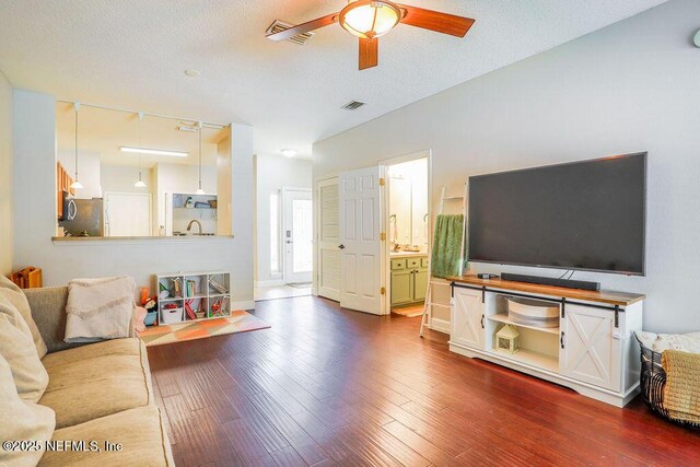 307 Southern Branch Ln, Saint Johns, FL 32259 - living area with ceiling fan and dark wood-type flooring