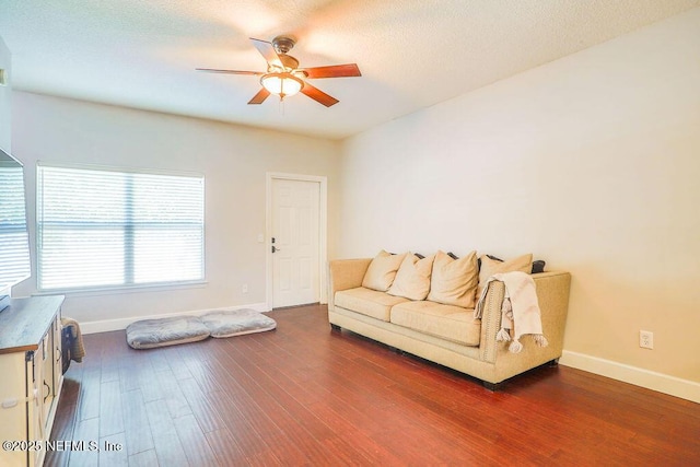 307 Southern Branch Ln, Saint Johns, FL 32259 - living room featuring a ceiling fan, dark wood-style flooring, and a textured ceiling