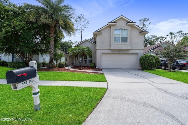 1630 Highland View Ct, Fleming Island, FL 32003 - traditional-style house featuring an attached garage, a front lawn, stucco siding, and concrete driveway