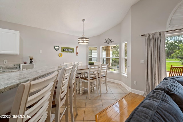 1630 Highland View Ct, Fleming Island, FL 32003 - dining area featuring lofted ceiling and light tile patterned floors