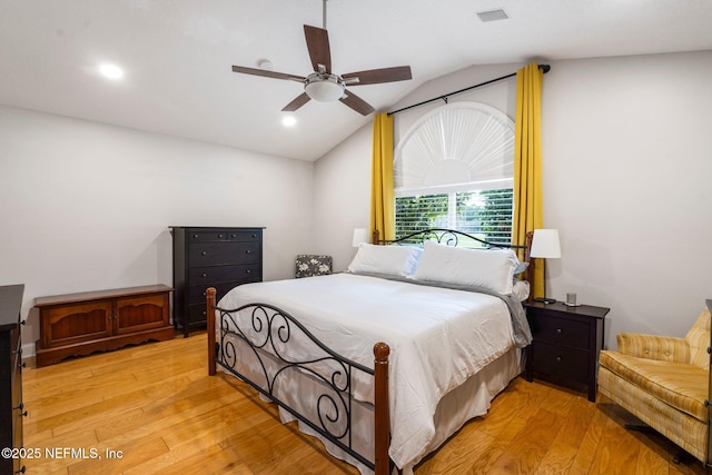 1630 Highland View Ct, Fleming Island, FL 32003 - bedroom featuring vaulted ceiling, light wood finished floors, a ceiling fan, and recessed lighting