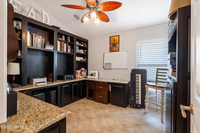 1630 Highland View Ct, Fleming Island, FL 32003 - office space with vaulted ceiling, a ceiling fan, light tile patterned floors, and built in study area
