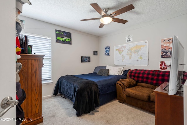 1630 Highland View Ct, Fleming Island, FL 32003 - carpeted bedroom featuring a textured ceiling and a ceiling fan