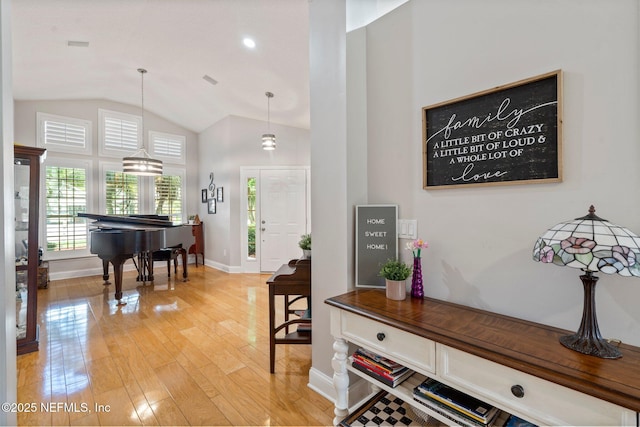 1630 Highland View Ct, Fleming Island, FL 32003 - foyer entrance featuring vaulted ceiling and light wood-style flooring