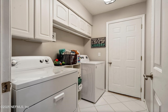 1630 Highland View Ct, Fleming Island, FL 32003 - laundry room featuring washer and dryer, light tile patterned floors, and cabinet space