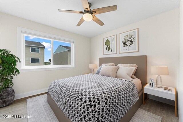 3385 Coastal Hwy Unit 23, Saint Augustine, FL 32084 - bedroom featuring wood finished floors and ceiling fan