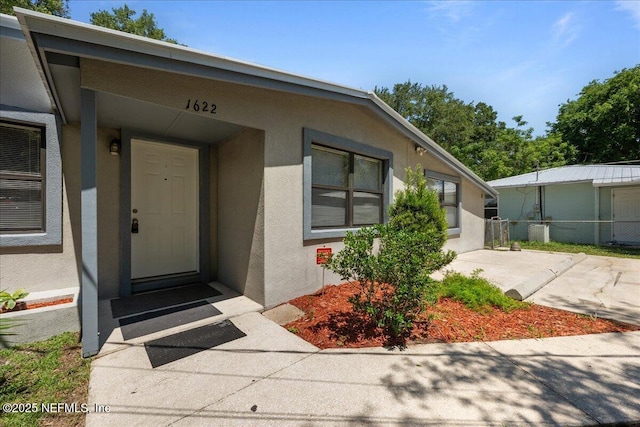 1622 Roselle Ave, Palatka, FL 32177 - property entrance with stucco siding