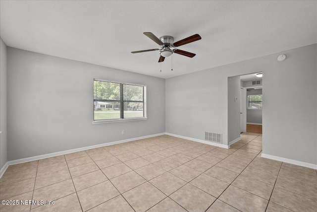 1622 Roselle Ave, Palatka, FL 32177 - unfurnished room with a ceiling fan, a smoke detector, and light tile patterned floors