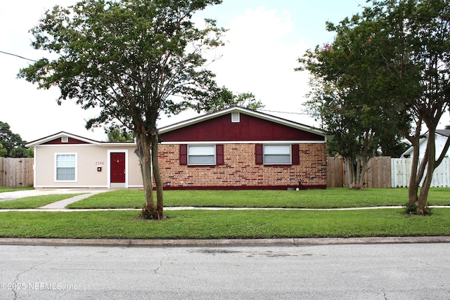 2590 Eastill Dr, Jacksonville, FL 32211 - ranch-style home featuring brick siding