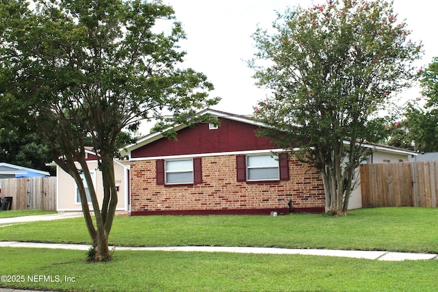 2590 Eastill Dr, Jacksonville, FL 32211 - view of front of house with brick siding