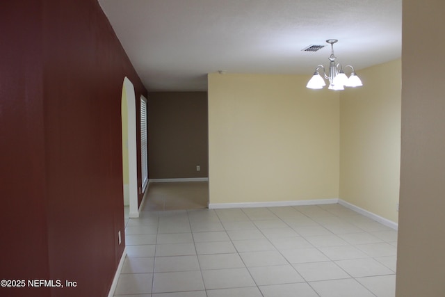 2590 Eastill Dr, Jacksonville, FL 32211 - unfurnished room with a chandelier and light tile patterned floors