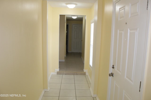 2590 Eastill Dr, Jacksonville, FL 32211 - hall featuring light tile patterned floors and baseboards
