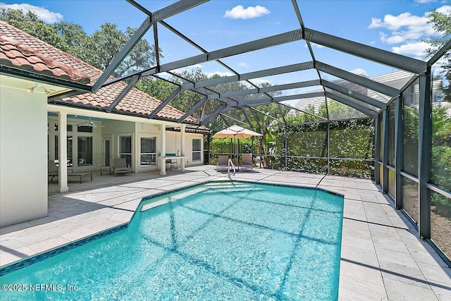 104 Haverhill Dr, Ponte Vedra Beach, FL 32082 - swimming pool with a patio, ceiling fan, and glass enclosure