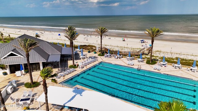 104 Haverhill Dr, Ponte Vedra Beach, FL 32082 - community pool with a patio and view of water and beach