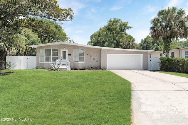 4903 Tennessee St, Jacksonville, FL 32208 - single story home with a garage and driveway