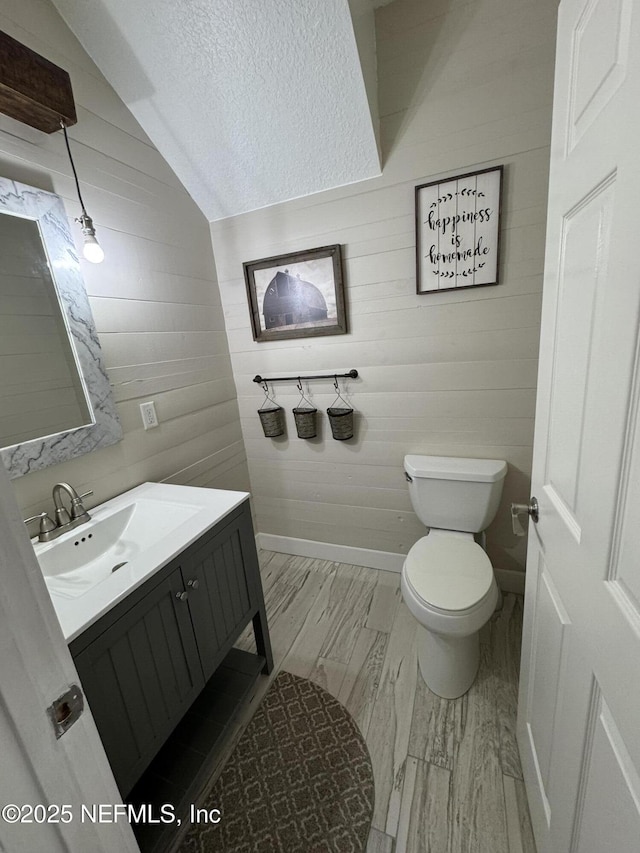 86163 Venetian Ave, Yulee, FL 32097 - half bath featuring wooden walls and vanity