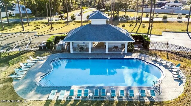86163 Venetian Ave, Yulee, FL 32097 - community pool with a patio area and an outdoor structure
