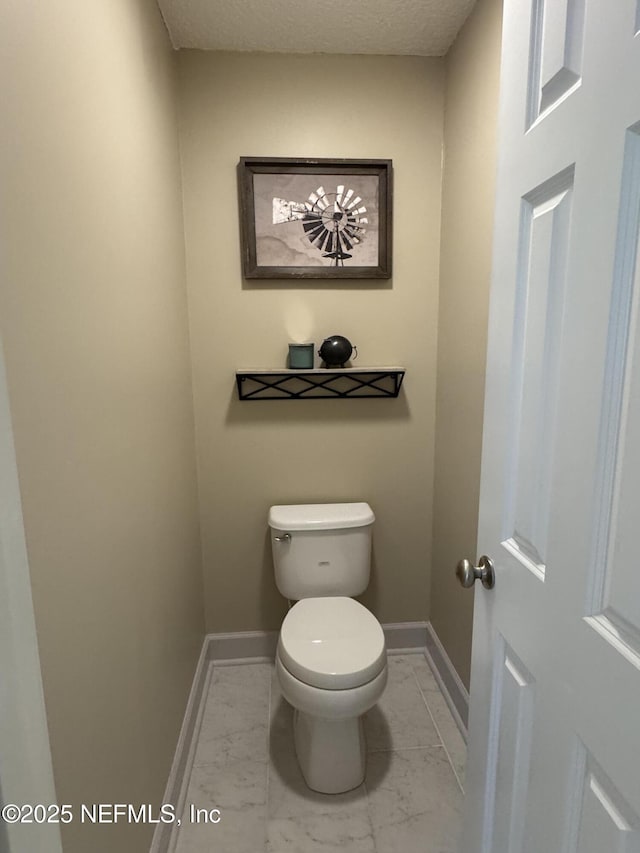 86163 Venetian Ave, Yulee, FL 32097 - bathroom with marble finish flooring and toilet