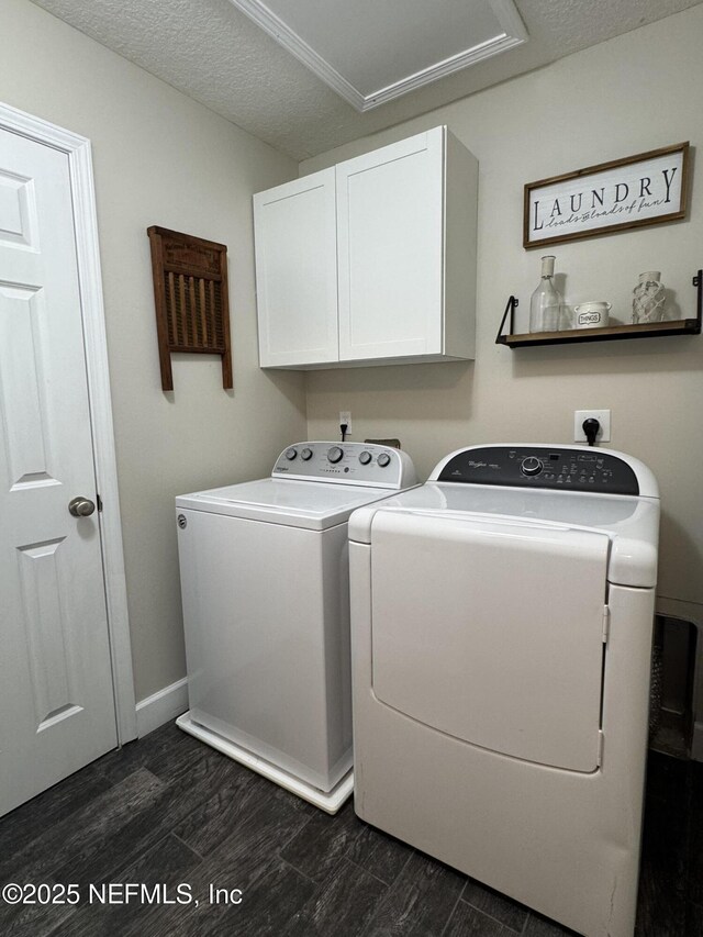 86163 Venetian Ave, Yulee, FL 32097 - laundry area with cabinet space, washing machine and dryer, and dark wood-type flooring