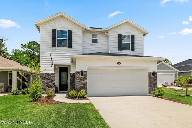 3283 Loblolly Pine Ct, Middleburg, FL 32068 - view of front of house featuring stone siding, a garage, a front lawn, and driveway