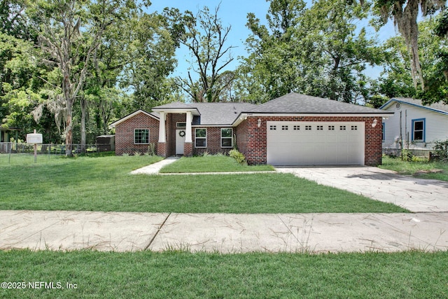 7442 Richardson Rd, Jacksonville, FL 32209 - view of front of house featuring an attached garage, driveway, brick siding, and a shingled roof