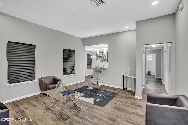 7442 Richardson Rd, Jacksonville, FL 32209 - exercise room with wood finished floors and recessed lighting