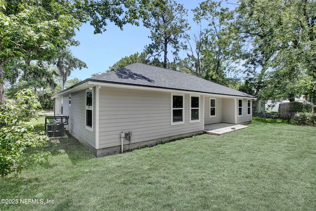 7442 Richardson Rd, Jacksonville, FL 32209 - rear view of house with a shingled roof