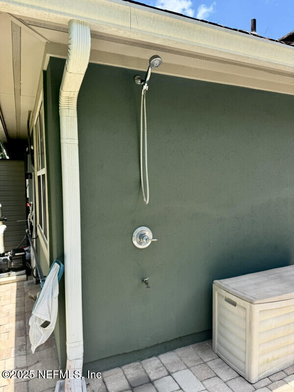 1703 Hunters Ridge Rd, Fleming Island, FL 32003 - exterior space featuring stucco siding