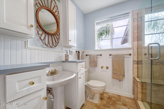 2910 Lake Shore Blvd, Jacksonville, FL 32210 - bathroom with a shower stall and wainscoting