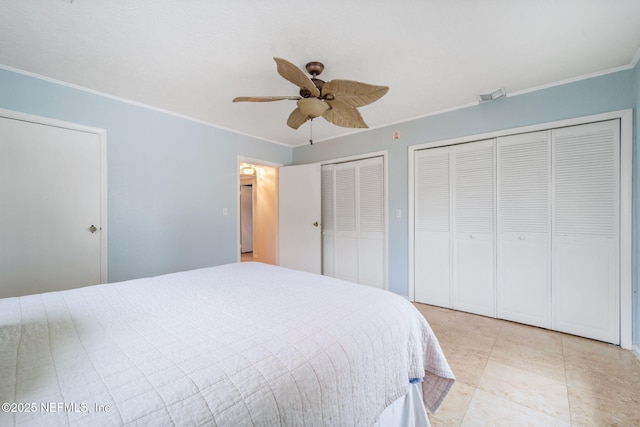2910 Lake Shore Blvd, Jacksonville, FL 32210 - bedroom with two closets, crown molding, and ceiling fan
