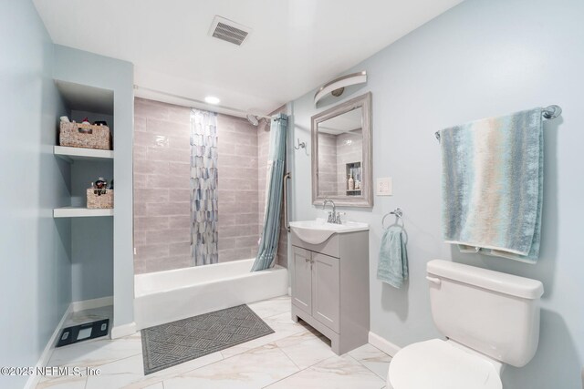 2910 Lake Shore Blvd, Jacksonville, FL 32210 - bathroom with vanity, marble look tile flooring, shower / tub combo, and recessed lighting