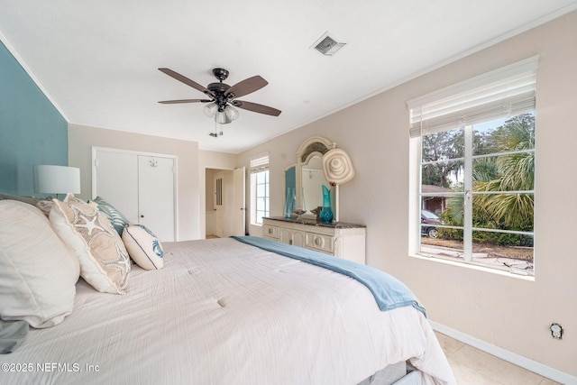 2910 Lake Shore Blvd, Jacksonville, FL 32210 - tiled bedroom featuring crown molding and a ceiling fan
