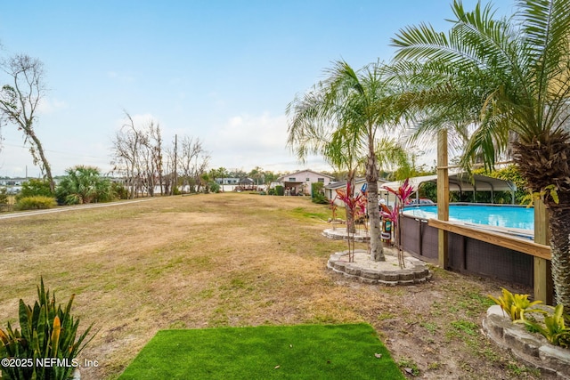 2910 Lake Shore Blvd, Jacksonville, FL 32210 - view of green lawn featuring an outdoor pool
