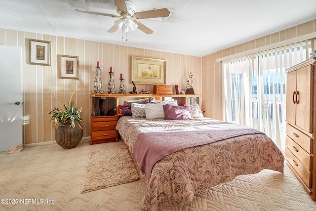 2910 Lake Shore Blvd, Jacksonville, FL 32210 - carpeted bedroom with a textured ceiling and ceiling fan
