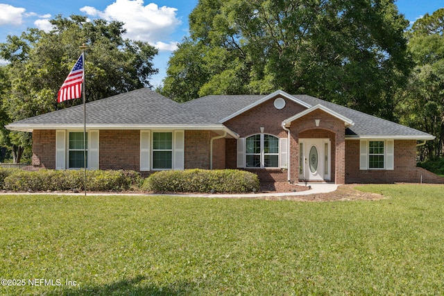 96031 Glen Laurel Ct, Yulee, FL 32097 - single story home featuring a front lawn, brick siding, and roof with shingles