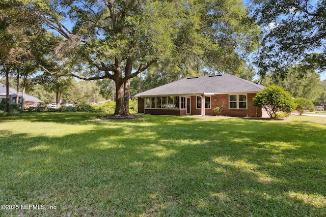 96031 Glen Laurel Ct, Yulee, FL 32097 - ranch-style home featuring a front lawn and brick siding