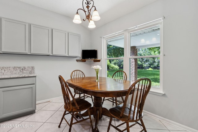 96031 Glen Laurel Ct, Yulee, FL 32097 - dining space featuring a chandelier and light tile patterned floors