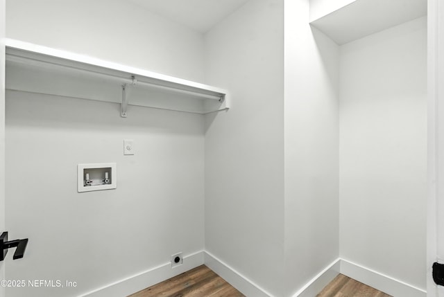 82 Cortez Ave, Saint Augustine, FL 32080 - washroom with electric dryer hookup, washer hookup, and dark wood-style floors