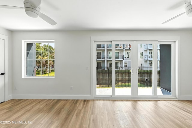 82 Cortez Ave, Saint Augustine, FL 32080 - doorway to outside with ceiling fan and light wood finished floors