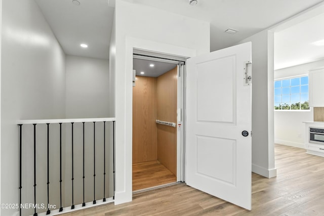 82 Cortez Ave, Saint Augustine, FL 32080 - hallway featuring wood finished floors and recessed lighting