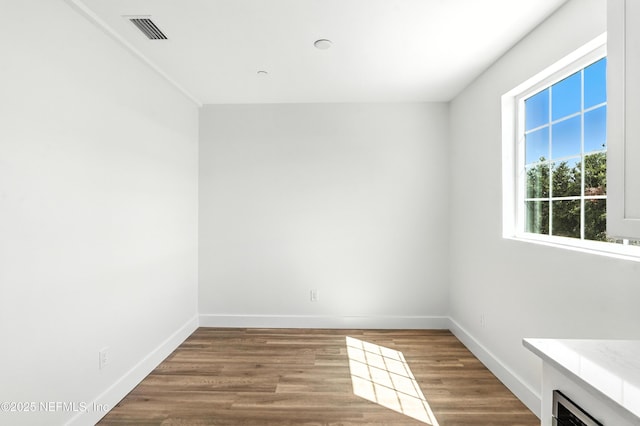 82 Cortez Ave, Saint Augustine, FL 32080 - empty room featuring baseboards and wood finished floors