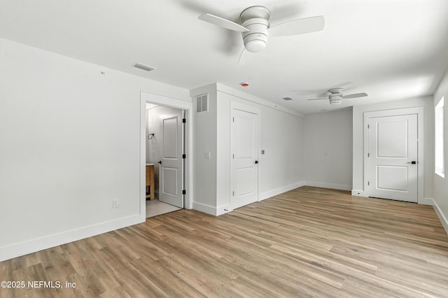 82 Cortez Ave, Saint Augustine, FL 32080 - unfurnished bedroom with light wood-style flooring, ensuite bath, and ceiling fan