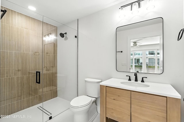 82 Cortez Ave, Saint Augustine, FL 32080 - bathroom with vanity, a shower stall, and ceiling fan