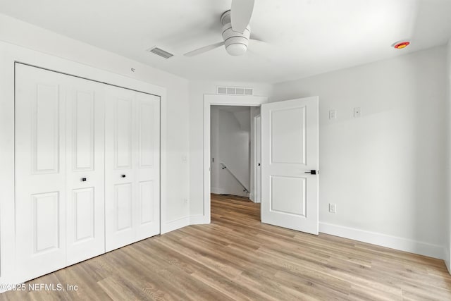 82 Cortez Ave, Saint Augustine, FL 32080 - unfurnished bedroom featuring a closet, light wood-style flooring, and ceiling fan
