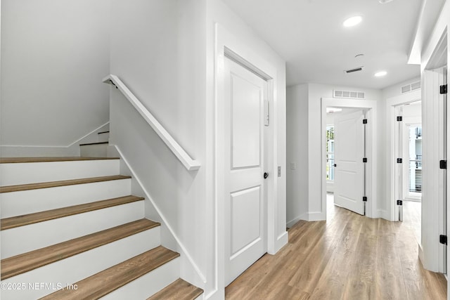 82 Cortez Ave, Saint Augustine, FL 32080 - staircase with recessed lighting and wood finished floors