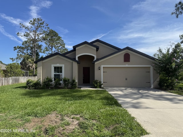 12 Wood Amber Ln, Palm Coast, FL 32164 - ranch-style house with stucco siding, driveway, and a garage