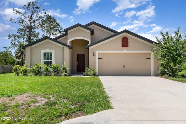 12 Wood Amber Ln, Palm Coast, FL 32164 - single story home featuring a garage, stucco siding, driveway, and a front yard