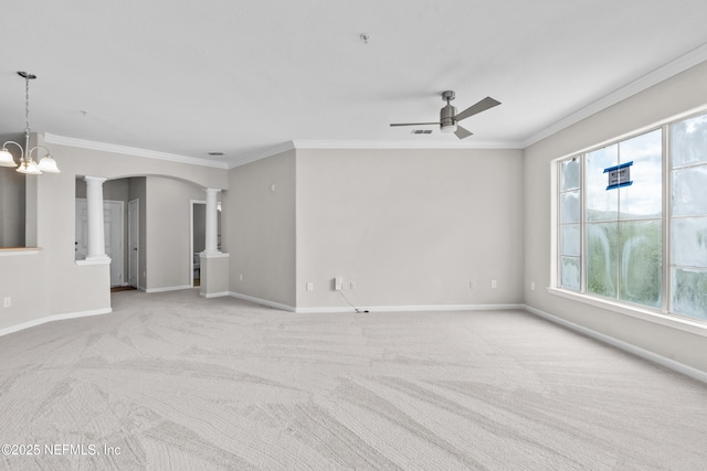 8290 Gate Pkwy Unit 1115, Jacksonville, FL 32216 - carpeted empty room with ceiling fan, ornate columns, crown molding, arched walkways, and a chandelier