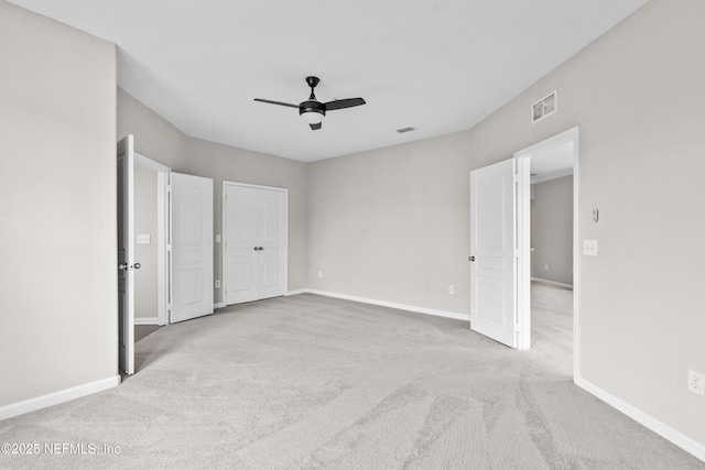 8290 Gate Pkwy Unit 1115, Jacksonville, FL 32216 - unfurnished bedroom featuring carpet floors and a ceiling fan