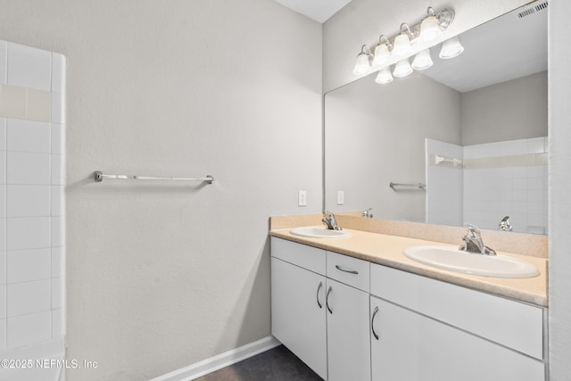 8290 Gate Pkwy Unit 1115, Jacksonville, FL 32216 - full bath with double vanity and a shower